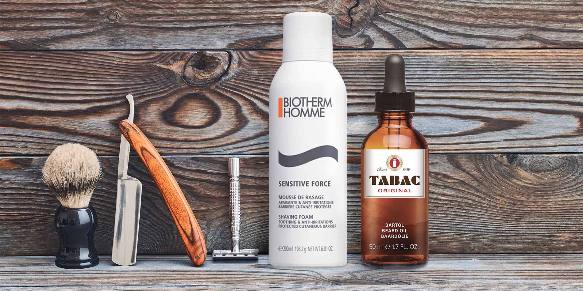 Vintage barber shop tools on old wooden background with copy space