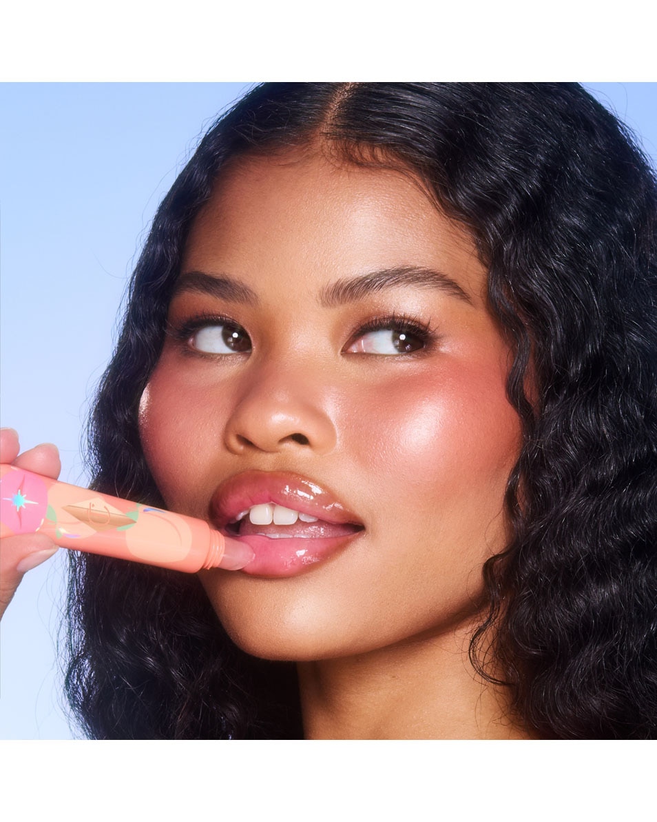 CHARLOTTE TILBURY Unreal Lips Huile pour les lèvres JUICYLICIOUS PURE PEACH 4