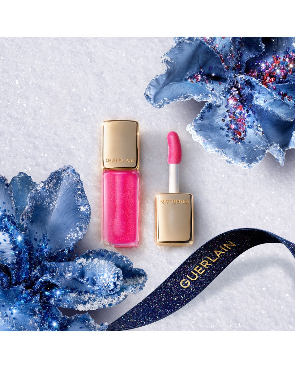 GUERLAIN KISS KISS Bee Glow Oil Een met honing verrijkte, getinte lipolie die voor 92% samengesteld is uit ingrediënten van natuurlijke oorsprong 419 SPOTLIGHT 2